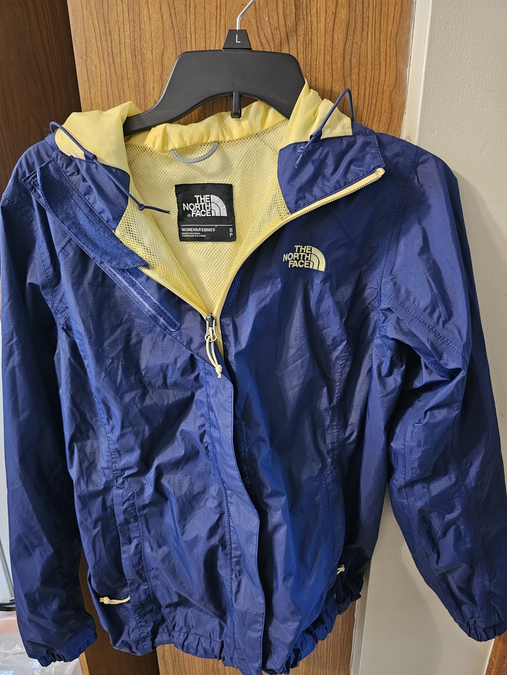 The North Face Navy Jacket with Yellow Lining
